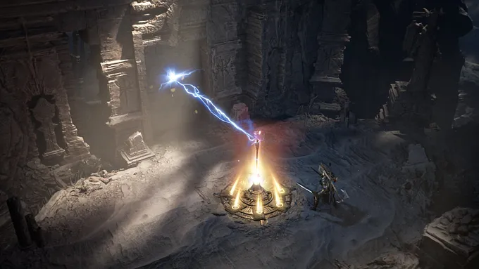Diablo 4 gameplay inside dark stone ruins. A character activates a glowing golden device that sends blue lightning toward a floating orb, as another armed character watches from the right.