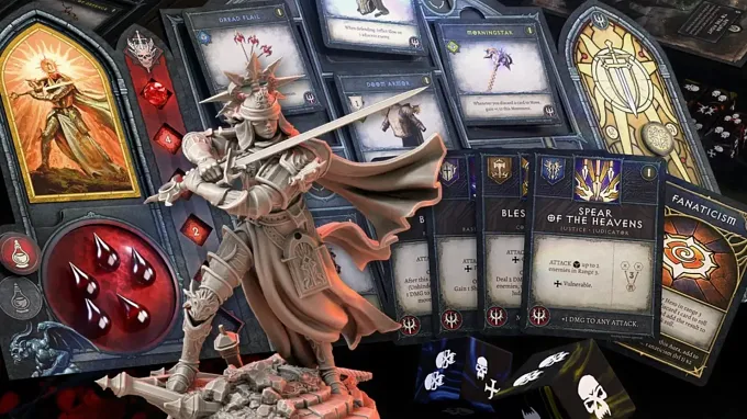 Diablo: Unbound tabletop game showing the paladin miniature, some of the card with abilities, the unique dice, and the player and game sheets