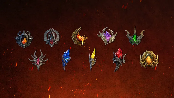 A collection of ten Diablo 4 Season 15 Soul Splinters arranged in two rows. Each has an ornate demonic frame surrounding a differently colored crystal, including red, blue, green, purple, yellow, and orange.
