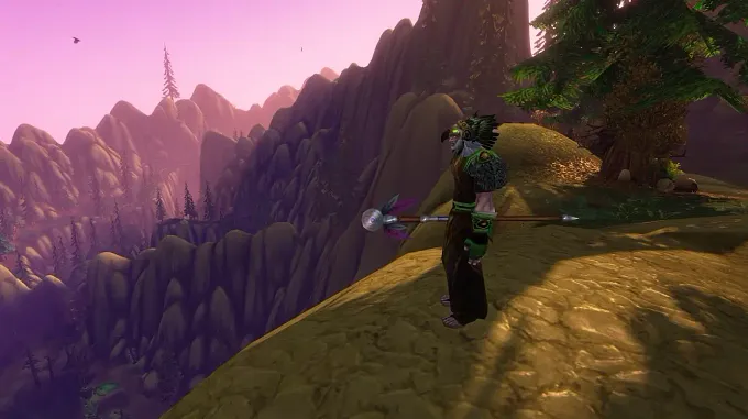 WoW Forever Mount Hyjal zone in the middle of the mountains, a Druid standing on a cliff, with a forest behind him and mountains surrounding him